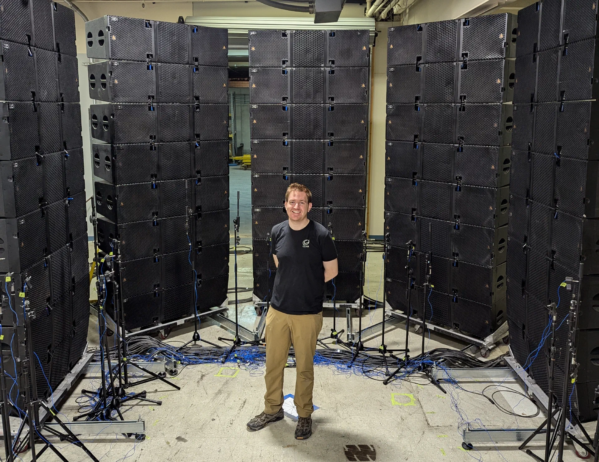 Karl in front of a large PA